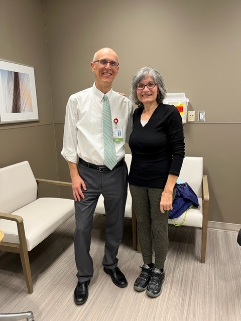 doctor golubic posting with his patient maja flannery in an exam room