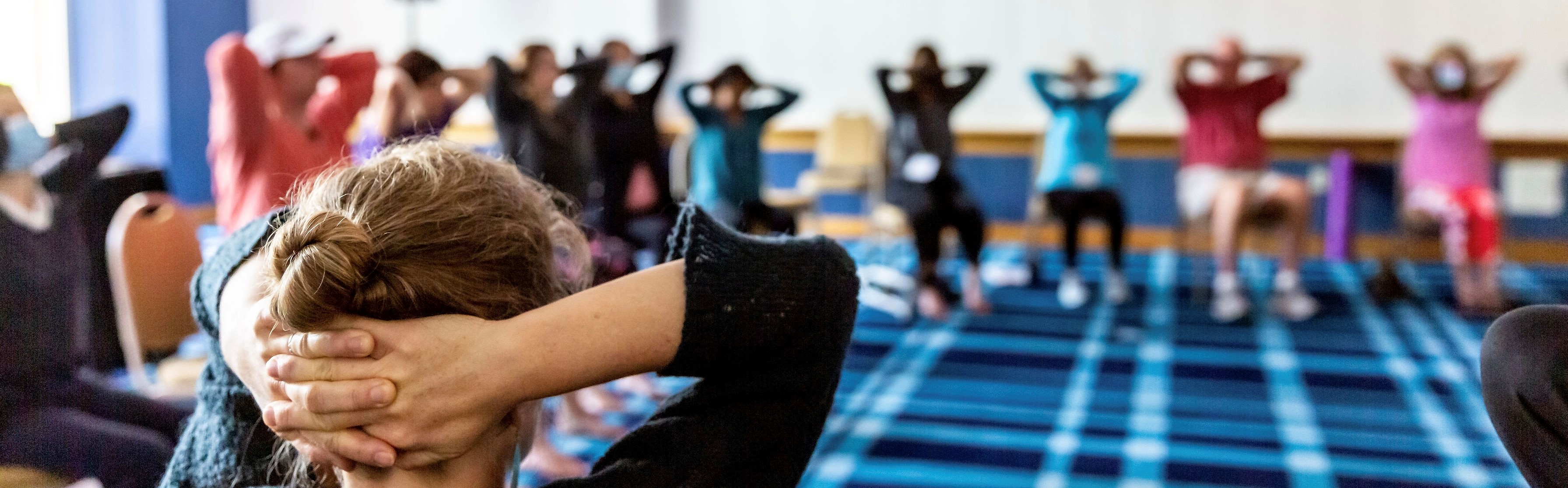 group of people in meditative activity