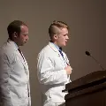 two people in white coats